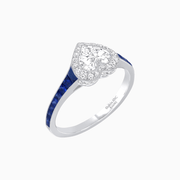 Art Deco Inspired Bezel-Set Heart Halo Ring with Calibré Gemstone Shoulders - Shahin Jewelry